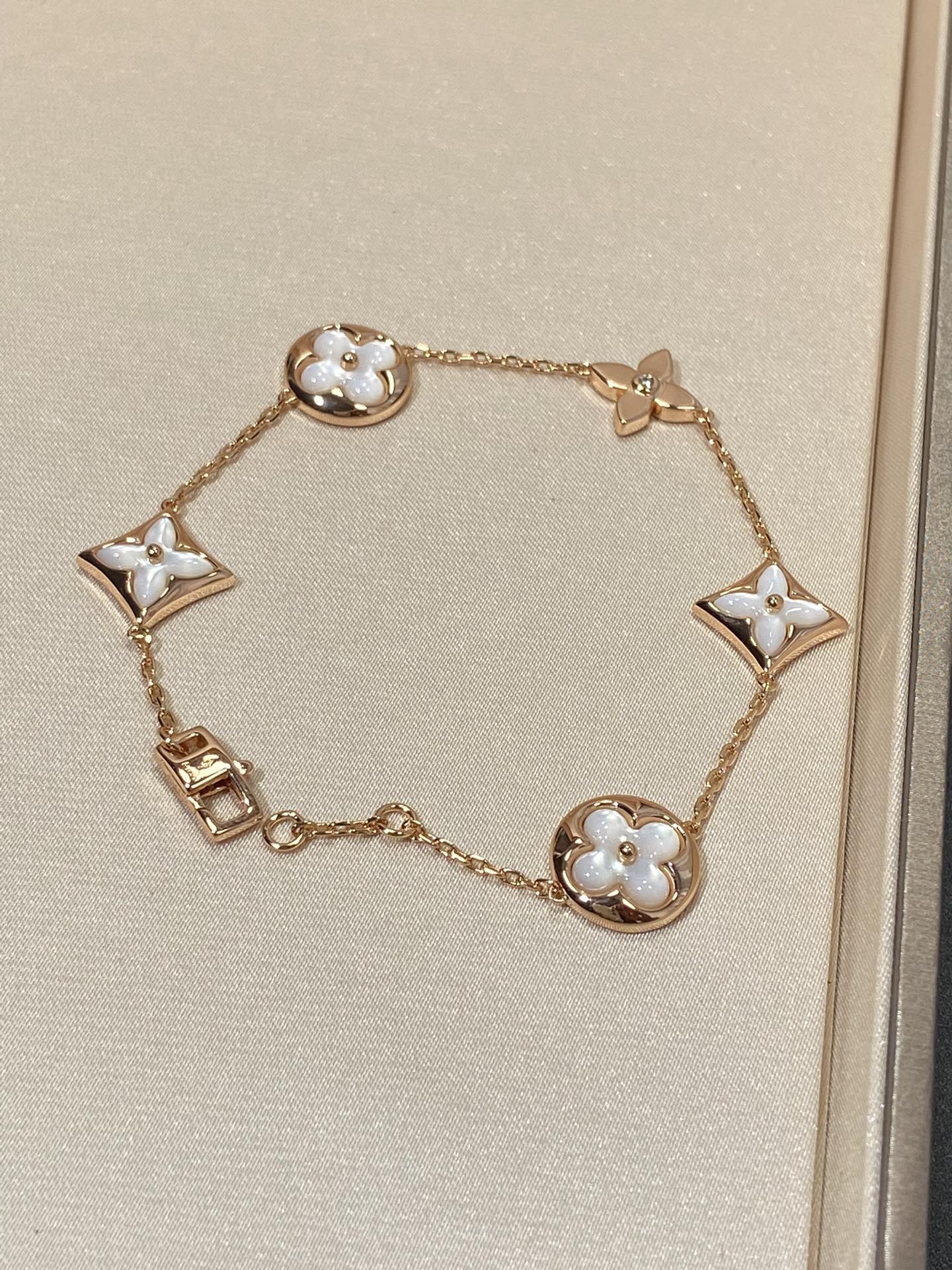 [Kincade Jewelery]STAR AND SUN 5 MOTIF MOP PINK GOLD BRACELET
