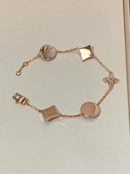 [Kincade Jewelery]STAR AND SUN 5 MOTIF MOP PINK GOLD BRACELET